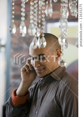 African American man talking on cell phone 11635275