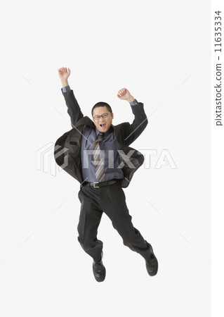 Asian businessman jumping 11635334