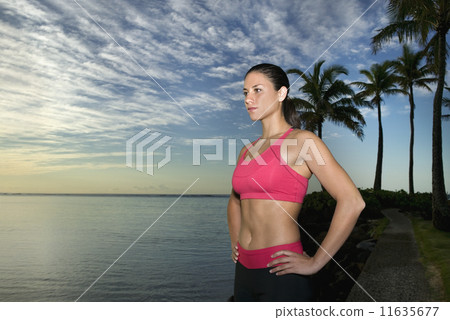 Pacific Islander woman with hands on hips 11635677
