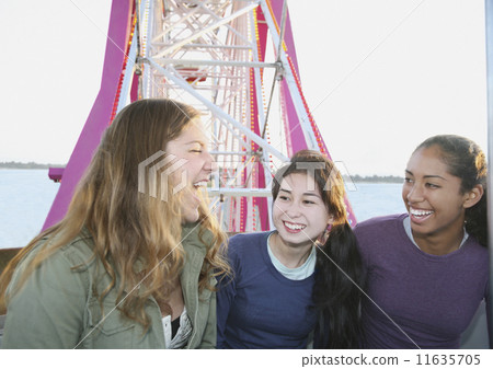 Multi-ethnic girls on Ferris wheel 11635705