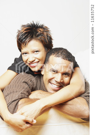 Young couple smiling for the camera Young couple smiling for the camera 11635752