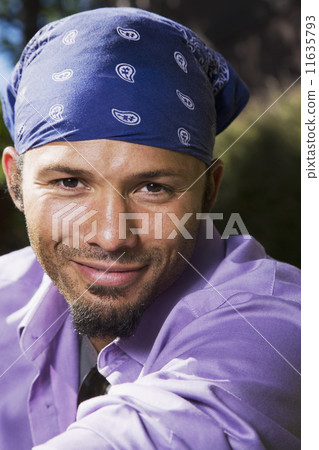 African man wearing bandana on head 11635793