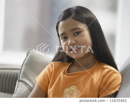 Portrait of young girl smiling 11635862