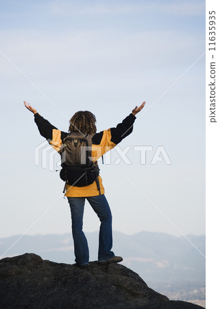 Young woman overlooking her surroundings 11635935
