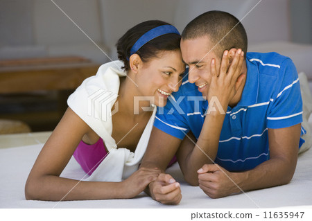Young couple smiling at each other Young couple smiling at each other 11635947