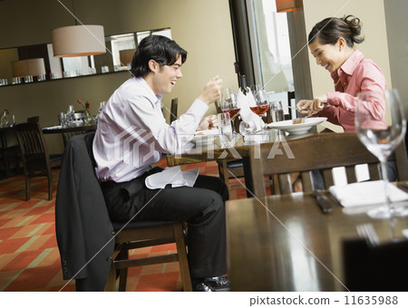Asian couple at restaurant 11635988