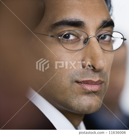 Close up of Indian businessman wearing eyeglasses Close up of Indian businessman wearing eyeglasses 11636006
