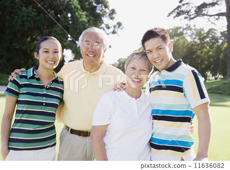 Asian family hugging 11636082