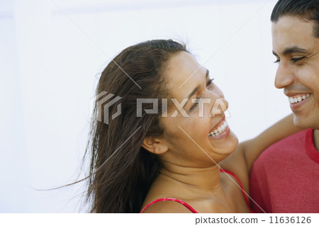 Young couple smiling at each other Young couple smiling at each other 11636126