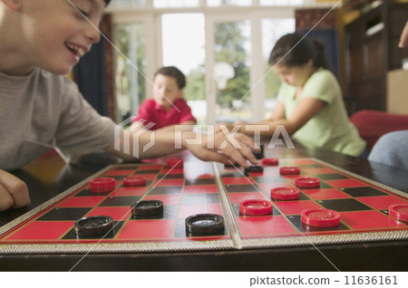 Children playing checkers Children playing checkers 11636161