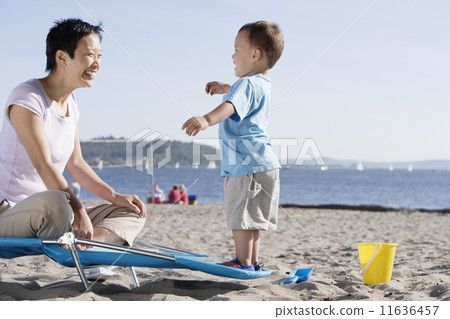 Mother and son at the beach 11636457