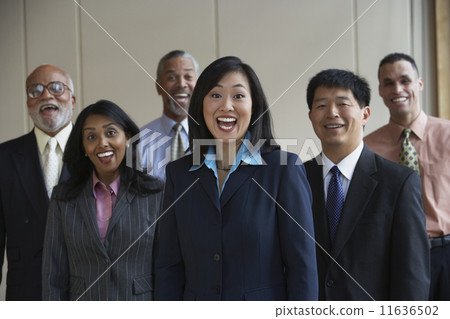 Group of co-workers laughing 11636502
