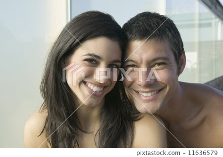 Close up of Hispanic couple smiling Close up of Hispanic couple smiling 11636579