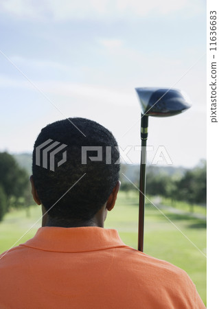 African man holding golf club African man holding golf club 11636683