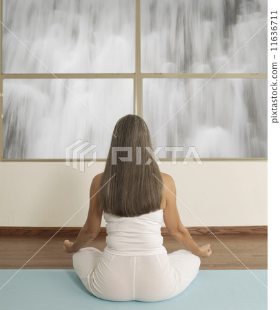 Asian woman practicing yoga Asian woman practicing yoga 11636711