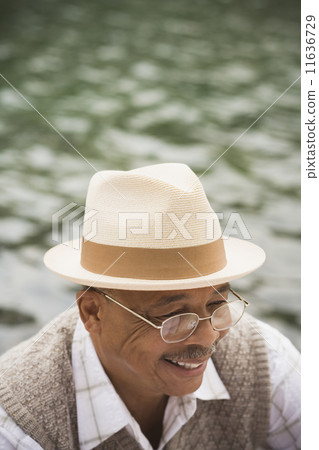 High angle view of senior African man smiling outdoors 11636729