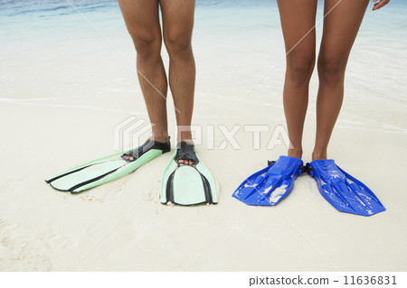 South American couple wearing flippers South American couple wearing flippers 11636831
