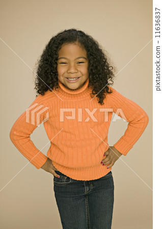 Pacific Islander girl with hands on hips 11636837