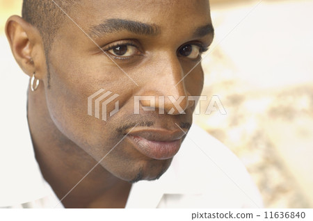 Close up of African man wearing earring 11636840