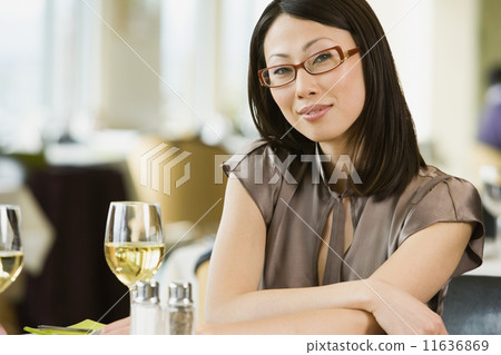 Asian businesswoman at restaurant 11636869