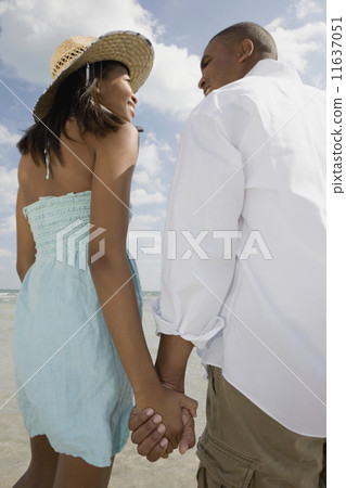 African couple smiling at each other 11637051