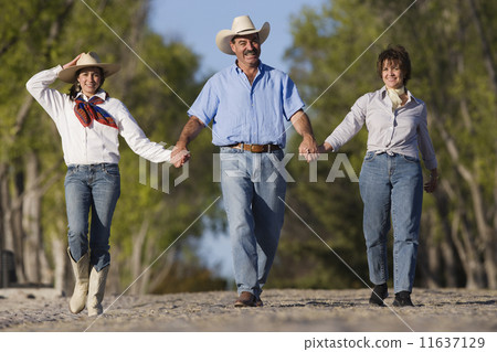 Hispanic family holding hands Hispanic family holding hands 11637129