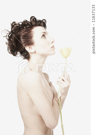 Nude woman holding flower 11637135