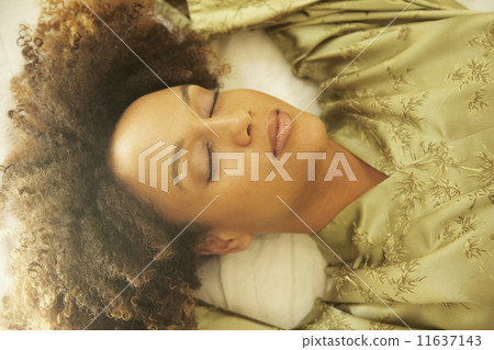 African American woman wearing silk robe African American woman wearing silk robe 11637143