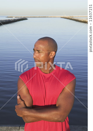 African American man in front of water African American man in front of water 11637151