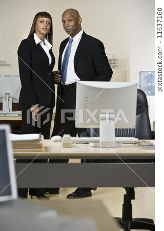 African businesspeople standing in office 11637160