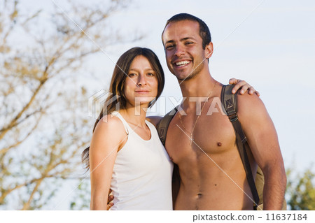 Hispanic couple hugging Hispanic couple hugging 11637184