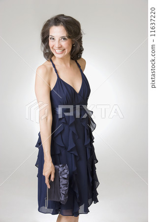 Hispanic woman in evening dress Hispanic woman in evening dress 11637220