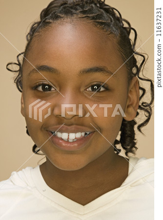 Close up of African American girl smiling Close up of African American girl smiling 11637231