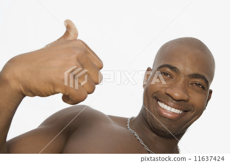 African man giving thumbs up 11637424