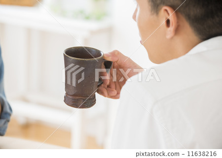 Men enjoying coffee Men enjoying coffee 11638216