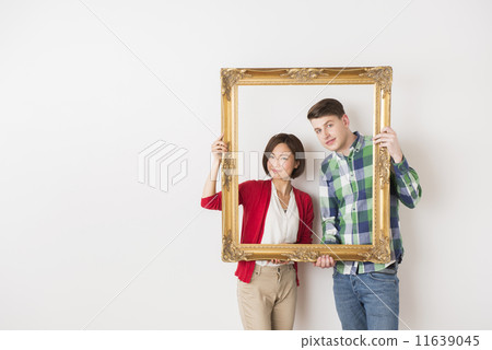 International marriage couple with frames 11639045