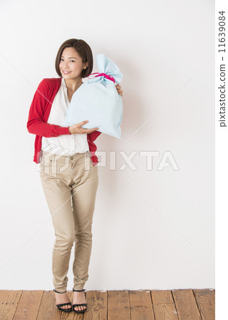 A young lady with a present A young lady with a present 11639084