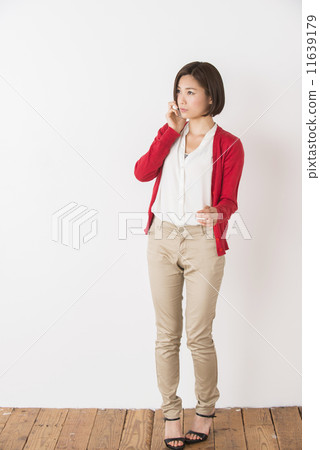 A young woman with a smartphone A young woman with a smartphone 11639179