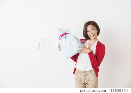 A young lady with a present 11639264