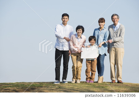 Three generations family walking with blue sky 11639306