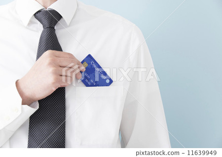 Cashless image of a businessman taking out a credit card Cashless image of a businessman taking out a credit card 11639949