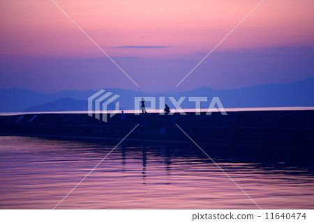 Evening scenery of the lake and angler Evening scenery of the lake and angler 11640474