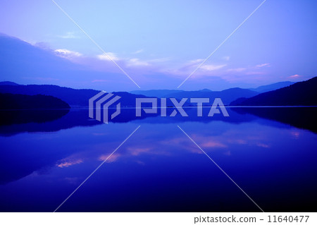 Evening landscape of the lake 11640477