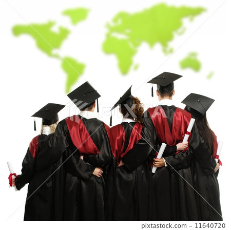 Group of graduated young students in black mantles against world map Group of graduated young students in black mantles against world map 11640720
