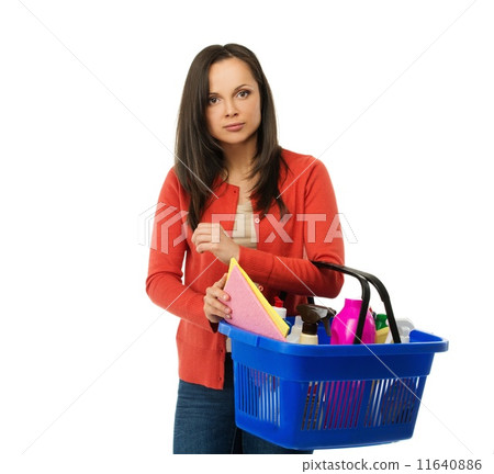 Beautiful cheerful brunette woman with basket full of cleansers 11640886