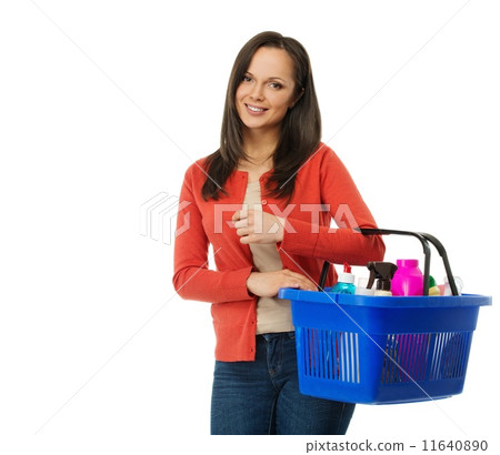 Beautiful cheerful brunette woman with basket full of cleansers Beautiful cheerful brunette woman with basket full of cleansers 11640890