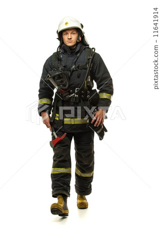 Young firefighter with helmet and axe isolated on white Young firefighter with helmet and axe isolated on white 11641914