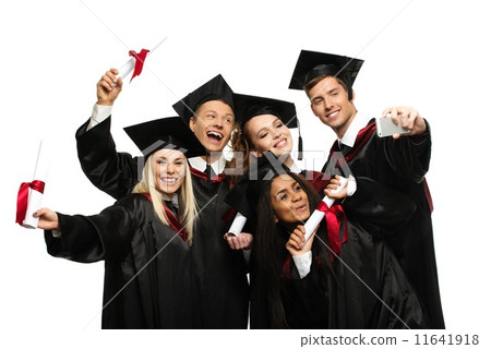 Multi ethnic group of graduated young students isolated on white Multi ethnic group of graduated young students isolated on white 11641918