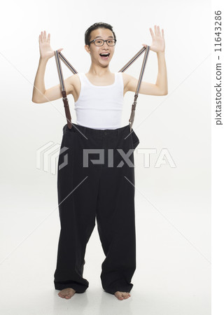 Young Asian Male with oversized pants Young Asian Male with oversized pants 11643286