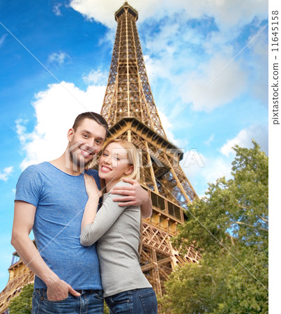 smiling couple hugging 11645158